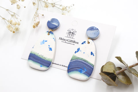 White & Blue Surf Board Statement
