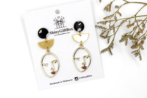 Black & Gold Face Red Lips Dangle